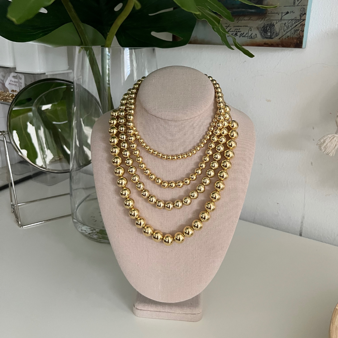 Collar Bolas Doradas