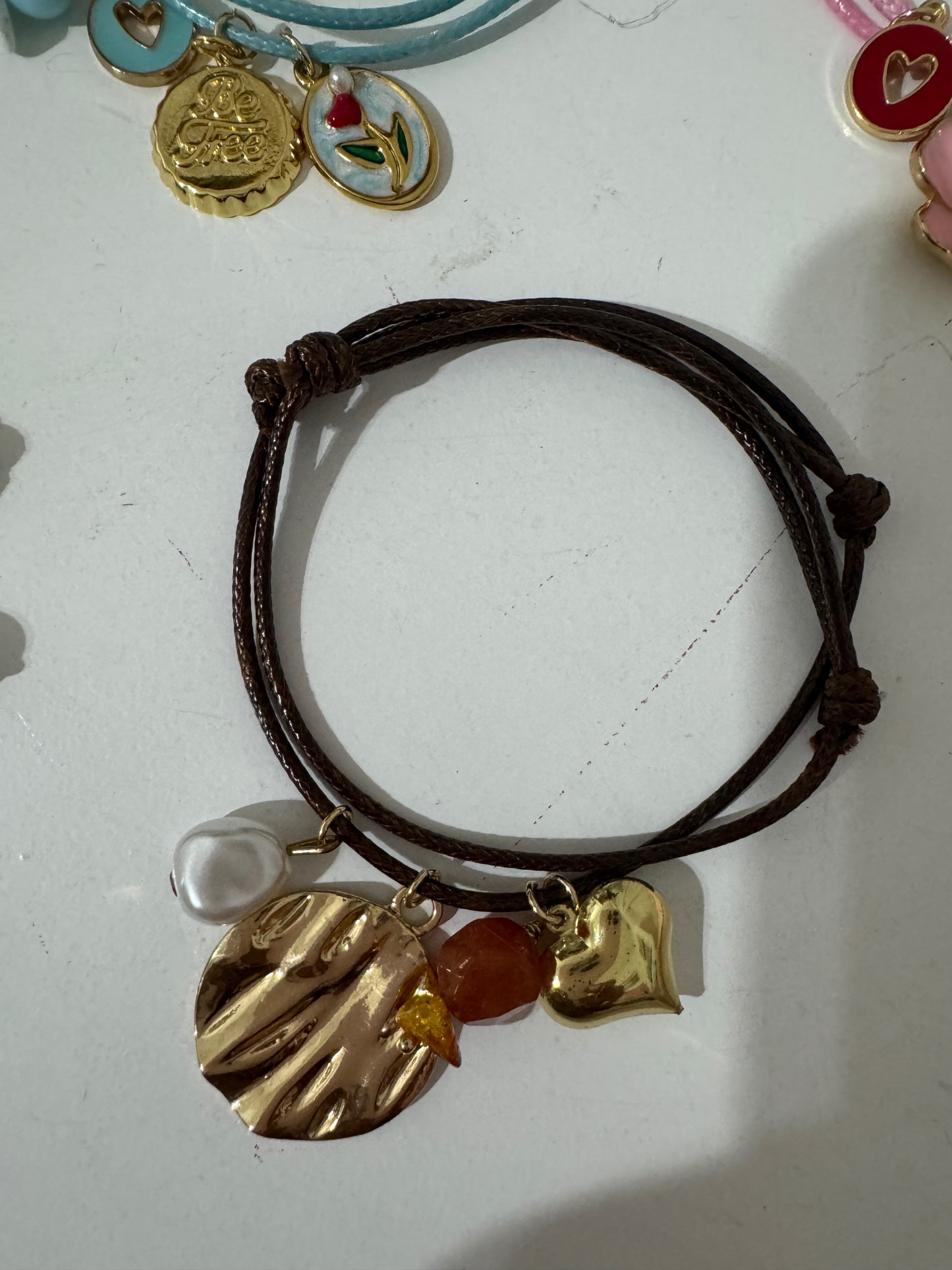 Pulseras en Hilo con Dijen