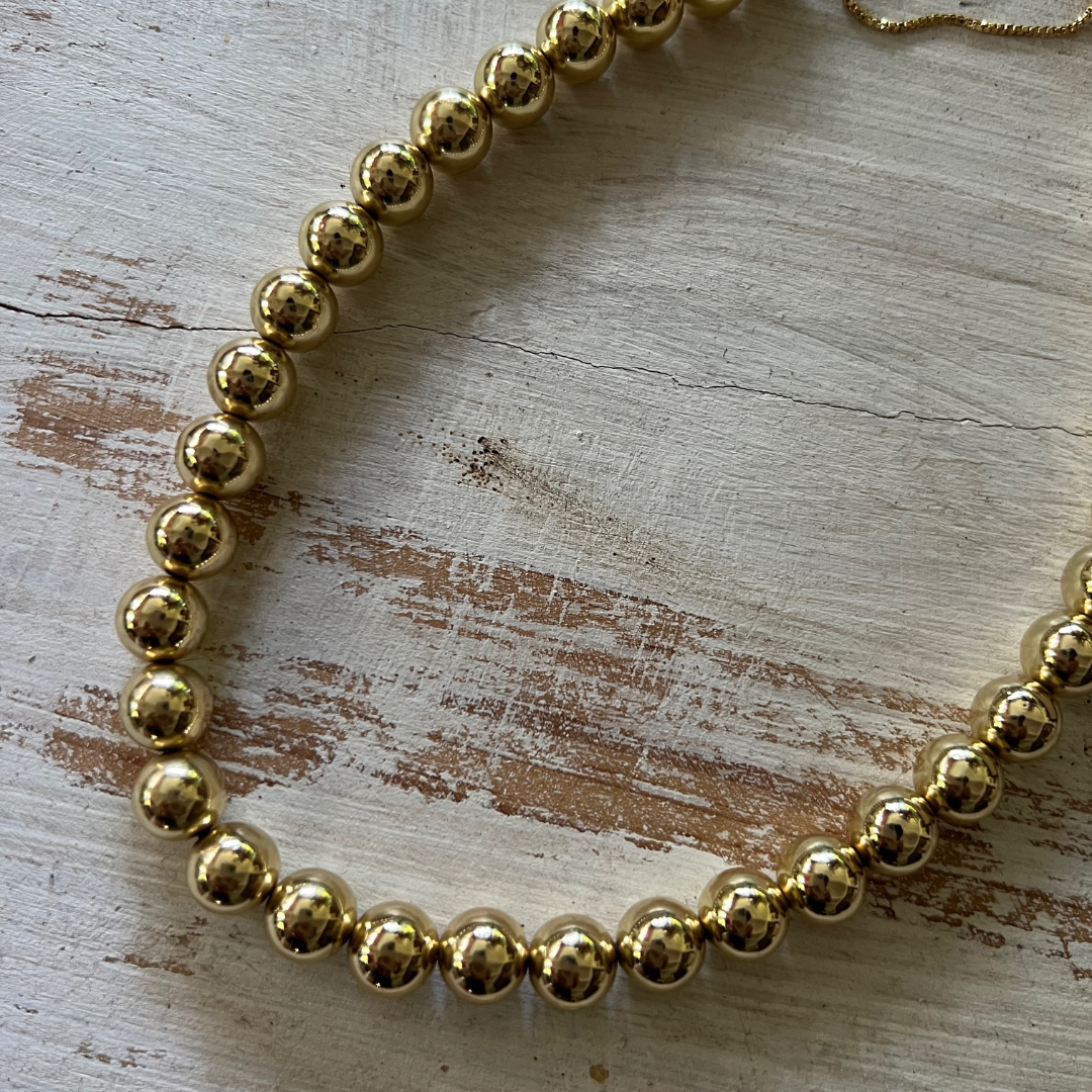 Collar Bolas Doradas