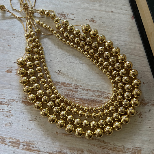 Collar Bolas Doradas