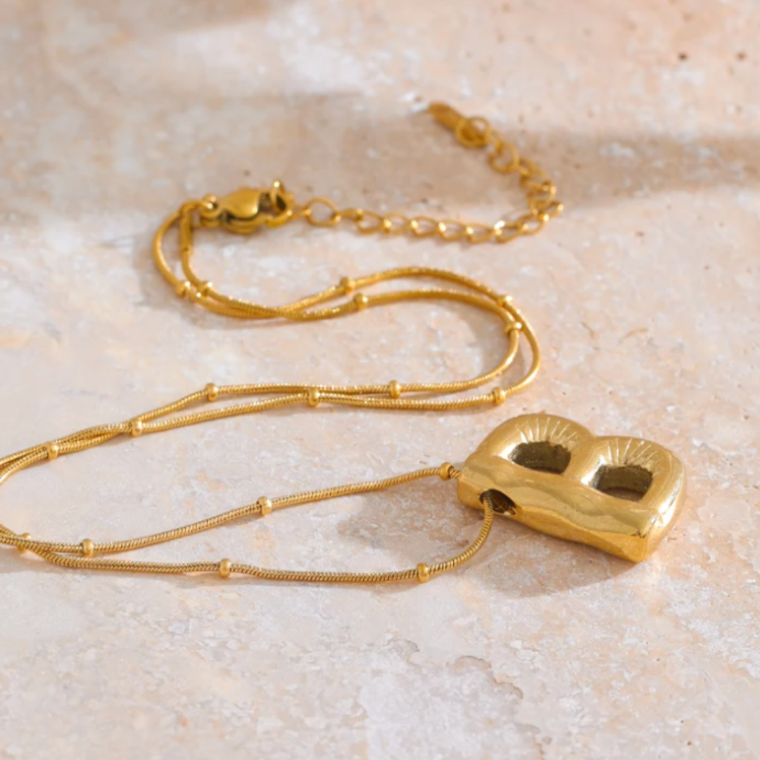 Cadena colgante de inicial